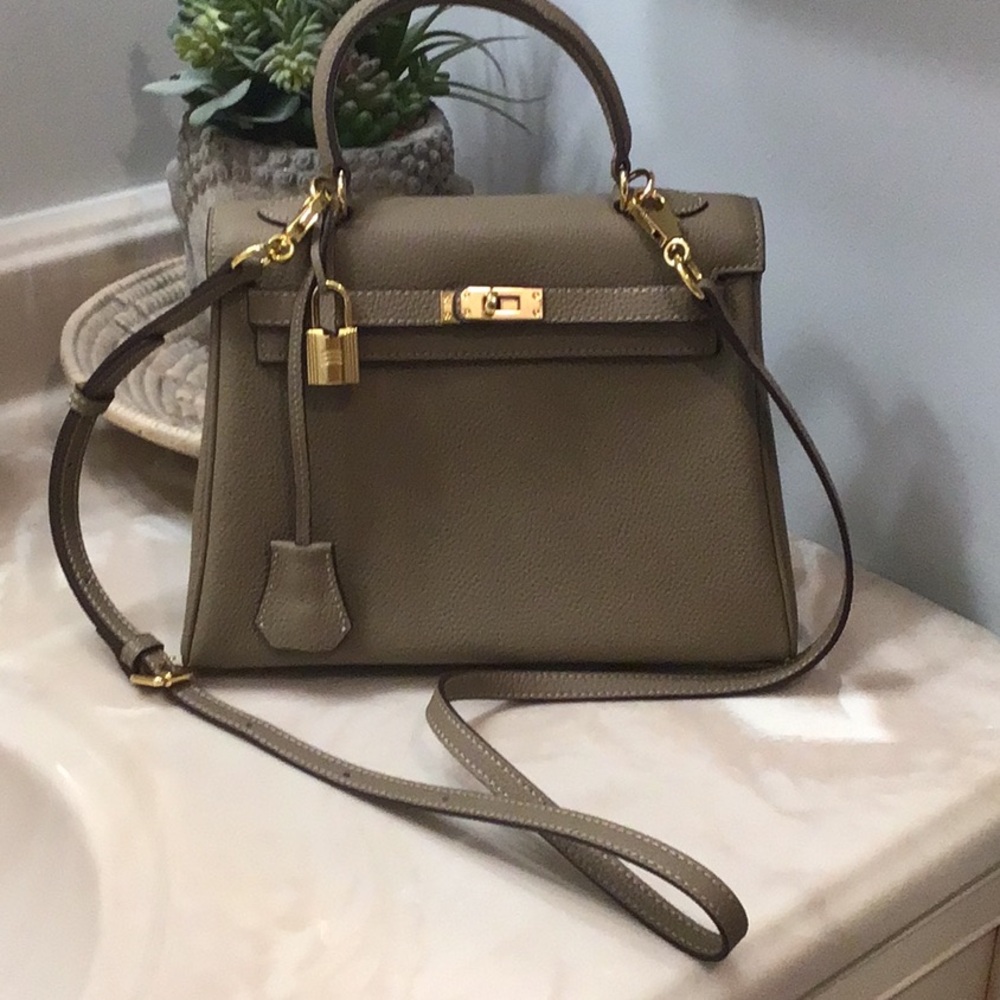 New Elegant Taupe Designer Inspired Satchel Bag with crossbody strap.